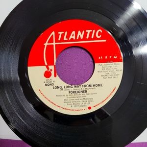 Lot of 2 Excellent 45s, Foreigner and Olivia Newton-John, see pics!!